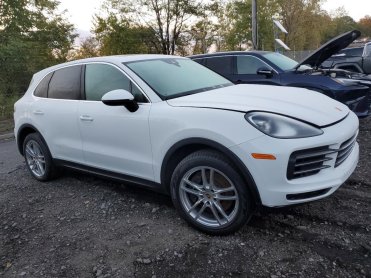 Salvage 2023 Porsche Cayenne  - White SUV - Front Three-Quarter View
