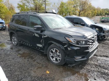 Salvage 2023 Honda Passport TRAIL SPORT - Black SUV - Front Three-Quarter View