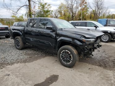 Salvage 2024 Toyota Tacoma trd - Black PickUp - Front Three-Quarter View