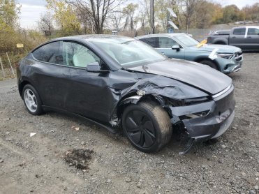Salvage 2026 Tesla Model Y  - Gray Sedan - Front Three-Quarter View