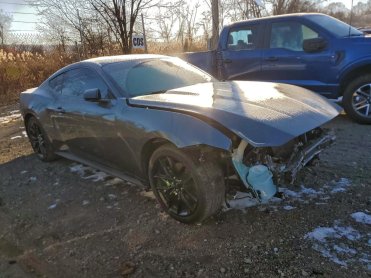 Salvage 2024 Ford Mustang  - Gray Coupe - Front Three-Quarter View