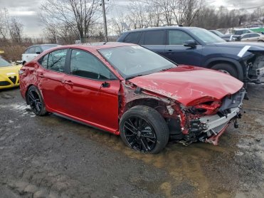 Salvage 2025 Toyota Camry XSE - Burgundy Sedan - Front Three-Quarter View
