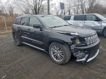 Salvage 2017 Jeep GRAND CHEROKEE SUMMIT - Black SUV - Front Three-Quarter View