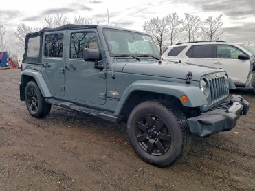 Salvage 2015 Jeep Wrangler UNLIMITED SAHARA - Gray SUV - Front Three-Quarter View