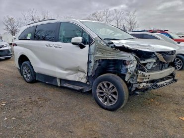 Salvage 2023 Toyota Sienna BRAUNABILITY - White Van - Front Three-Quarter View