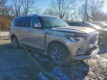 Salvage 2023 Infiniti Qx80 LUXE - Gold Van - Front Three-Quarter View