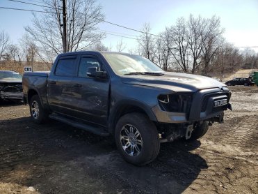 Salvage 2021 RAM 1500 REBEL - Gray PickUp - Front Three-Quarter View