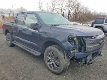 Salvage 2024 Ford F150 LIGHTNING XLT - Blue PickUp - Front Three-Quarter View