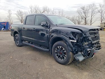 Salvage 2024 Nissan Titan PRO-4X - Black PickUp - Front Three-Quarter View