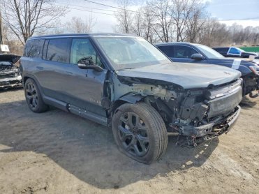 Salvage 2025 Rivian R1S ADVENTURE - Gray SUV - Front Three-Quarter View