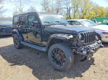 Salvage 2022 Jeep Wrangler UNLIMITED SAHARA - Black SUV - Front Three-Quarter View