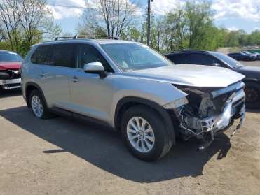 2025 Toyota Grand Highlander Hybrid XLE in Gray - Front Three-Quarter View - BidGoDrive Inventory