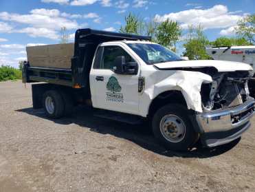2021 Ford F350 DUMP TRUCK in White - Front Three-Quarter View - BidGoDrive Inventory