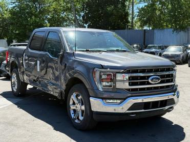 2023 FORD F150 Lariat in Gray - Front Three-Quarter View - BidGoDrive Inventory