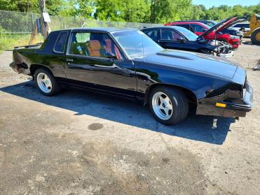 Salvage 1983 Oldsmobile Cutlass CALAIS - Black Coupe - Front Three-Quarter View