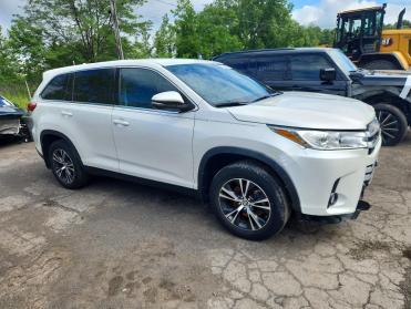2019 Toyota Highlander LE PLUS in White - Front Three-Quarter View - BidGoDrive Inventory