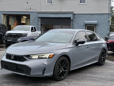 Salvage 2025 HONDA CIVIC SPORT HYBRID - Gray Sedan - Front Three-Quarter View