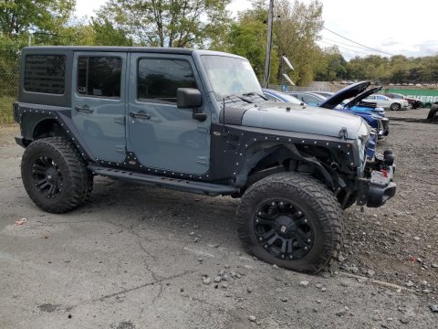 2015 Jeep Wrangler UNLIMITED SPORT in Blue - Front Three-Quarter View - BidGoDrive Inventory