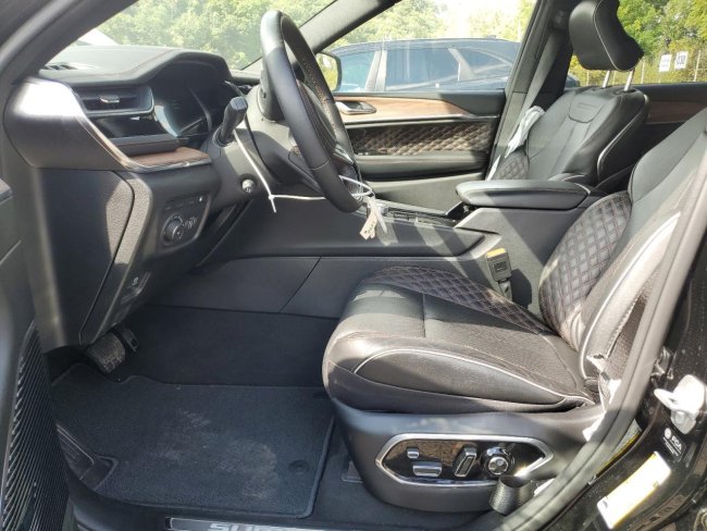Salvage 2023 Jeep Grand Cherokee Summit 4xe in Black