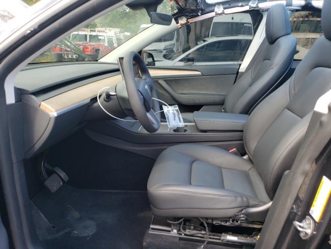Salvage 2025 Tesla Model Y  in Gray