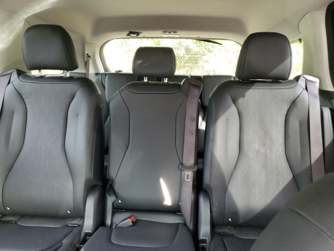 Salvage 2023 Kia Carnival Sx in Burgundy