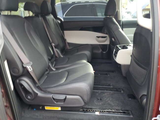 Salvage 2023 Kia Carnival Sx in Burgundy