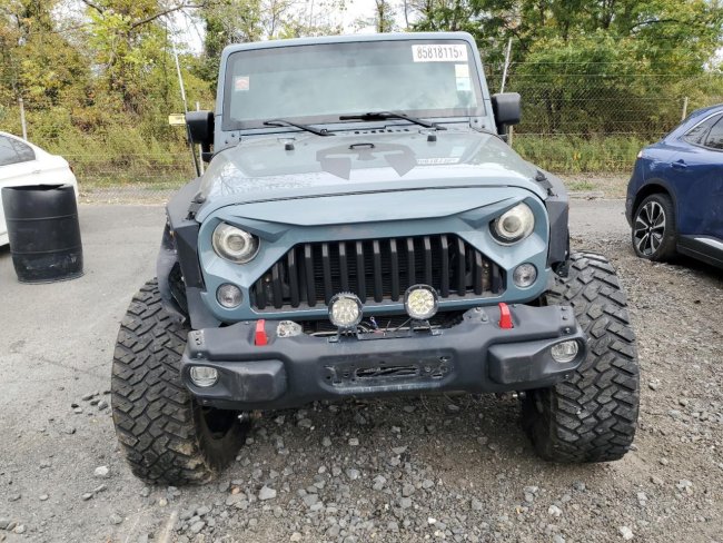 Salvage 2015 Jeep Wrangler Unlimited Sport in Blue