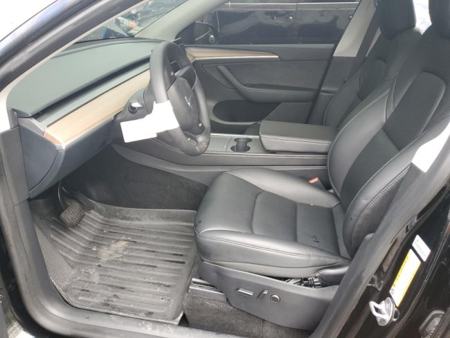 Salvage 2023 Tesla Model Y  in Черный