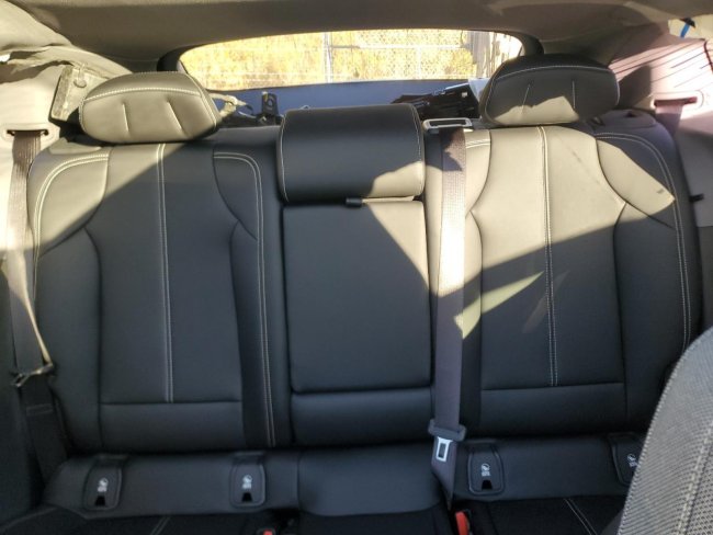 Salvage 2025 Cadillac Optiq Luxury in Burgundy