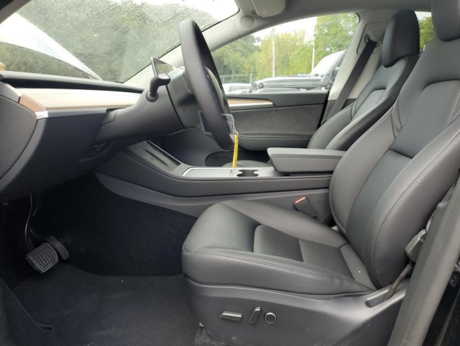 Salvage 2025 Tesla Model Y  in Black