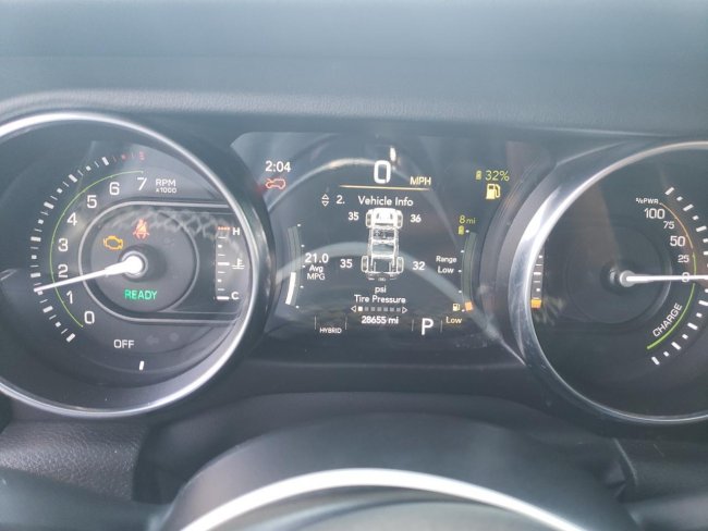 Salvage 2022 Jeep Wrangler Sahara 4xe in Red