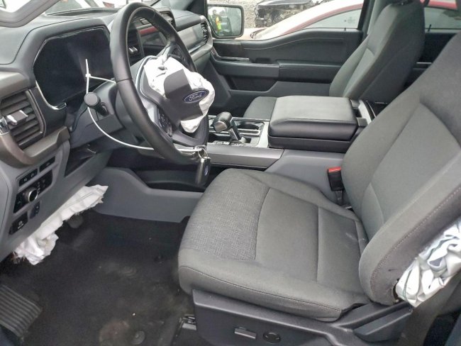 Salvage 2024 Ford F150 Lightning Xlt in Gray