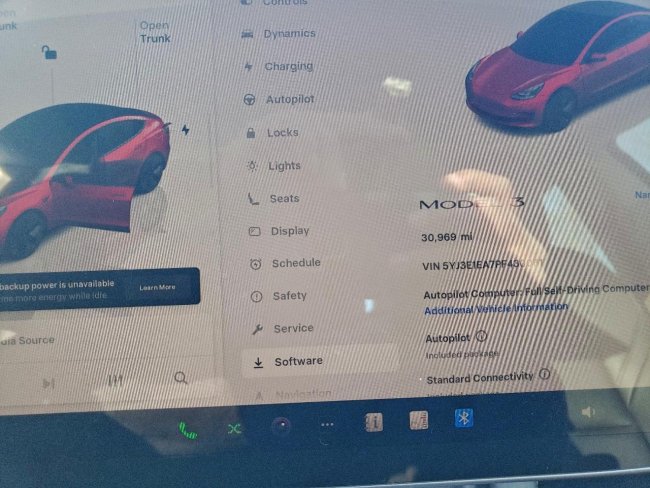 Salvage 2023 Tesla Model 3  in Red