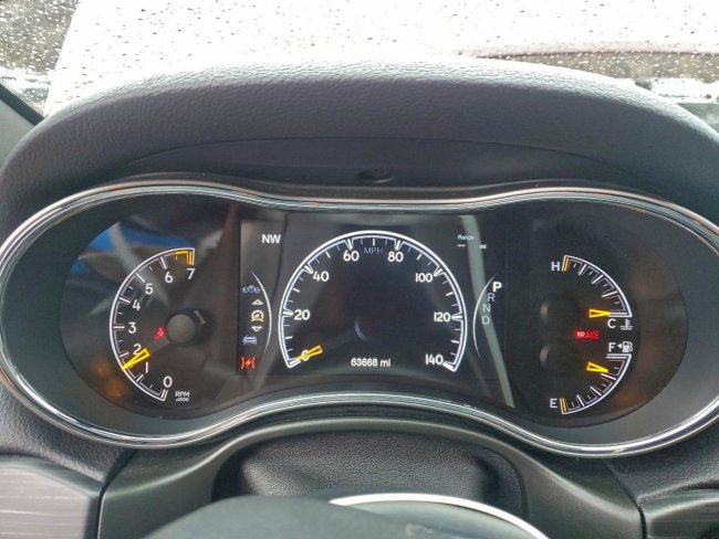 Salvage 2020 Jeep Grand Cherokee Laredo in Burgundy