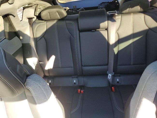 Salvage 2025 Cadillac Optiq Luxury in Burgundy