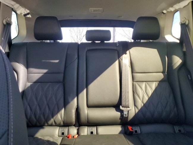 Salvage 2026 Nissan Rogue Platinum in Gold