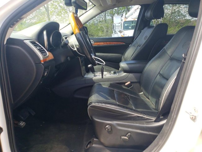 Salvage 2012 Jeep Grand Cherokee Overland in White