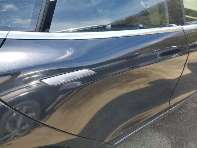 Salvage 2015 Tesla Model S  in Black