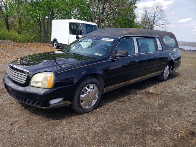 Salvage 2003 Cadillac Commercial Hearse in Black