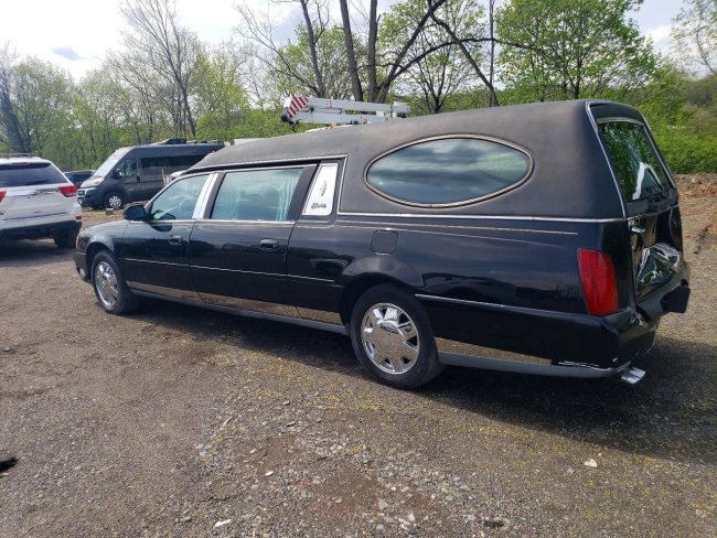 Salvage 2003 Cadillac Commercial Hearse in Black