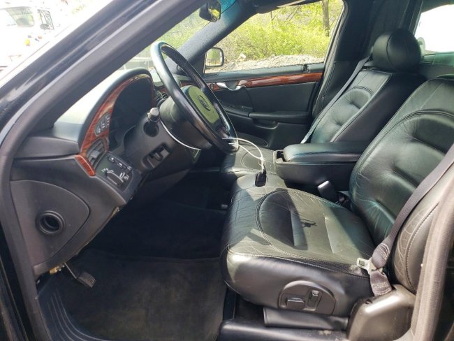 Salvage 2003 Cadillac Commercial Hearse in Black