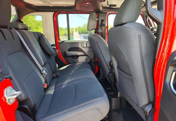 Salvage 2024 Jeep Wrangler Sahara 4xe in Red