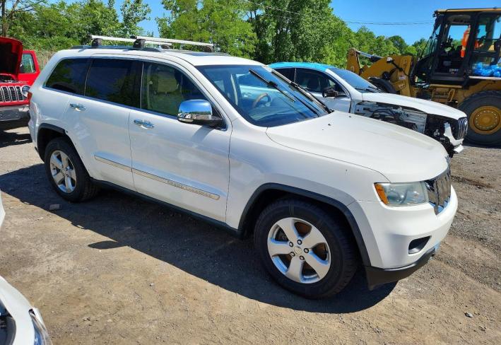 Salvage 2011 Jeep Grand Cherokee Overland in White