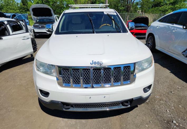 Salvage 2011 Jeep Grand Cherokee Overland in White