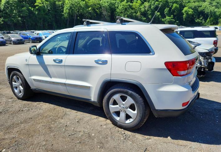 Salvage 2011 Jeep Grand Cherokee Overland in White