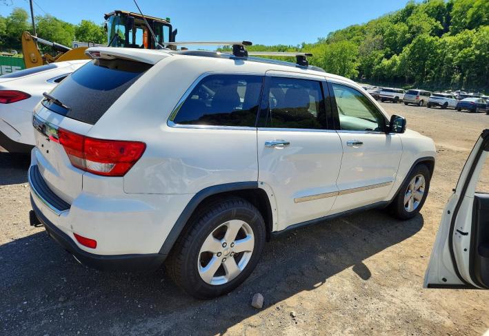 Salvage 2011 Jeep Grand Cherokee Overland in White
