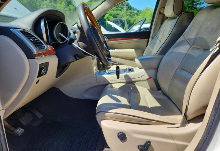 Salvage 2011 Jeep Grand Cherokee Overland in White