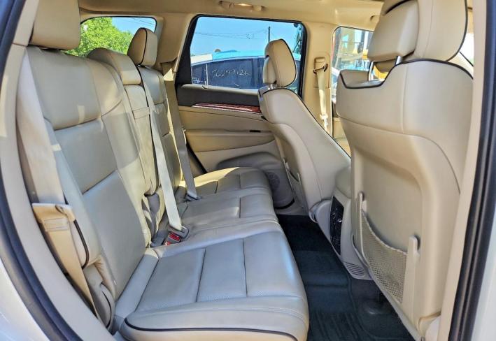 Salvage 2011 Jeep Grand Cherokee Overland in White