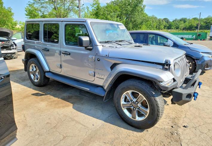 Salvage 2021 Jeep Wrangler Unlimited Sahara in Серебристый