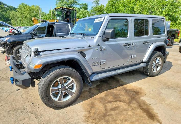Salvage 2021 Jeep Wrangler Unlimited Sahara in Серебристый